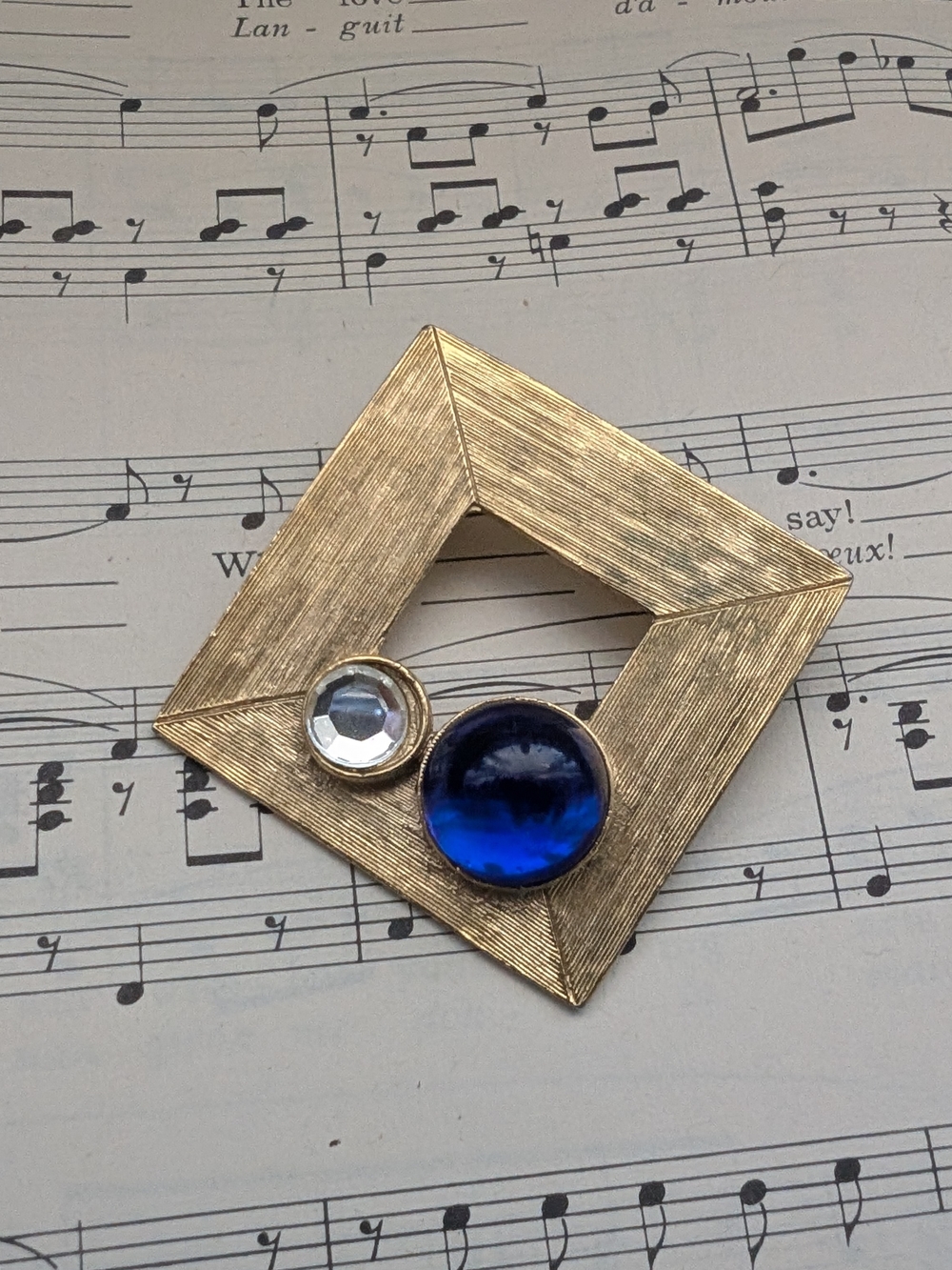Gold-Tone Geometric Brooch with Cobalt Blue and Clear Glass Cabochons